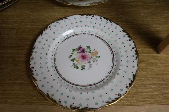 A small collection of decorative floral painted dessert dishes